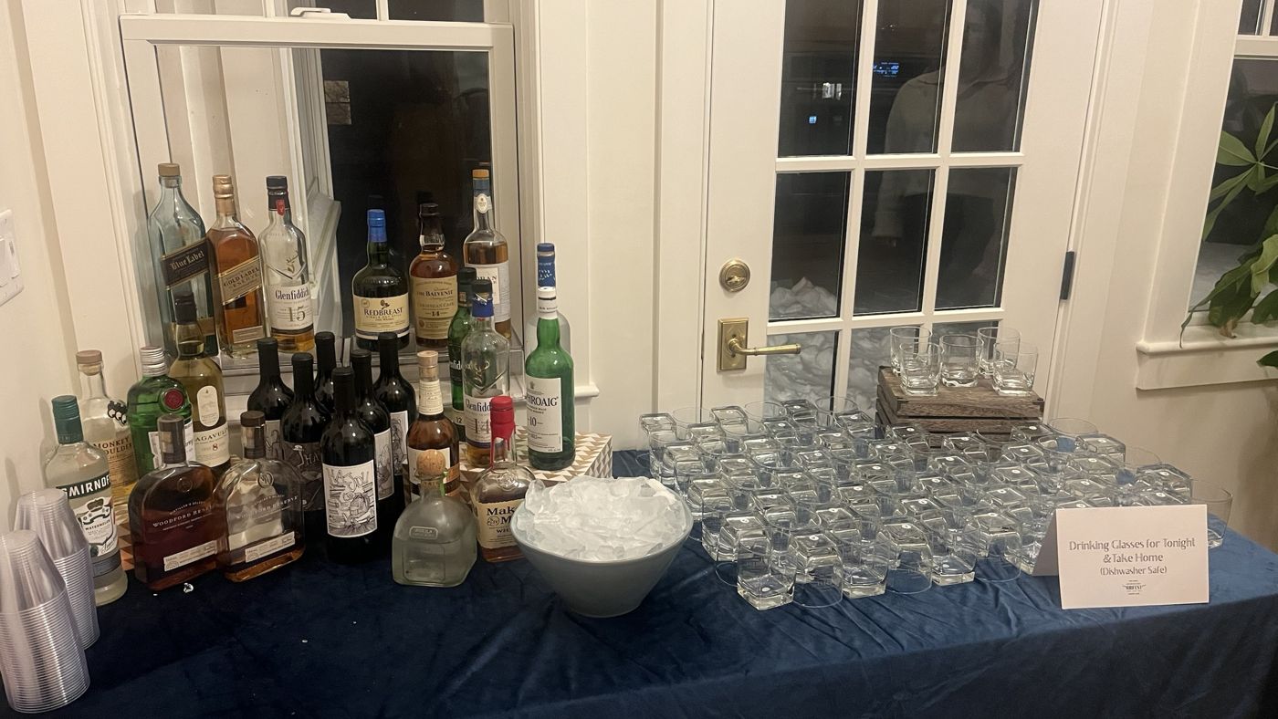 The bar: whiskey, wine and a table of take-home Ribfest glasses